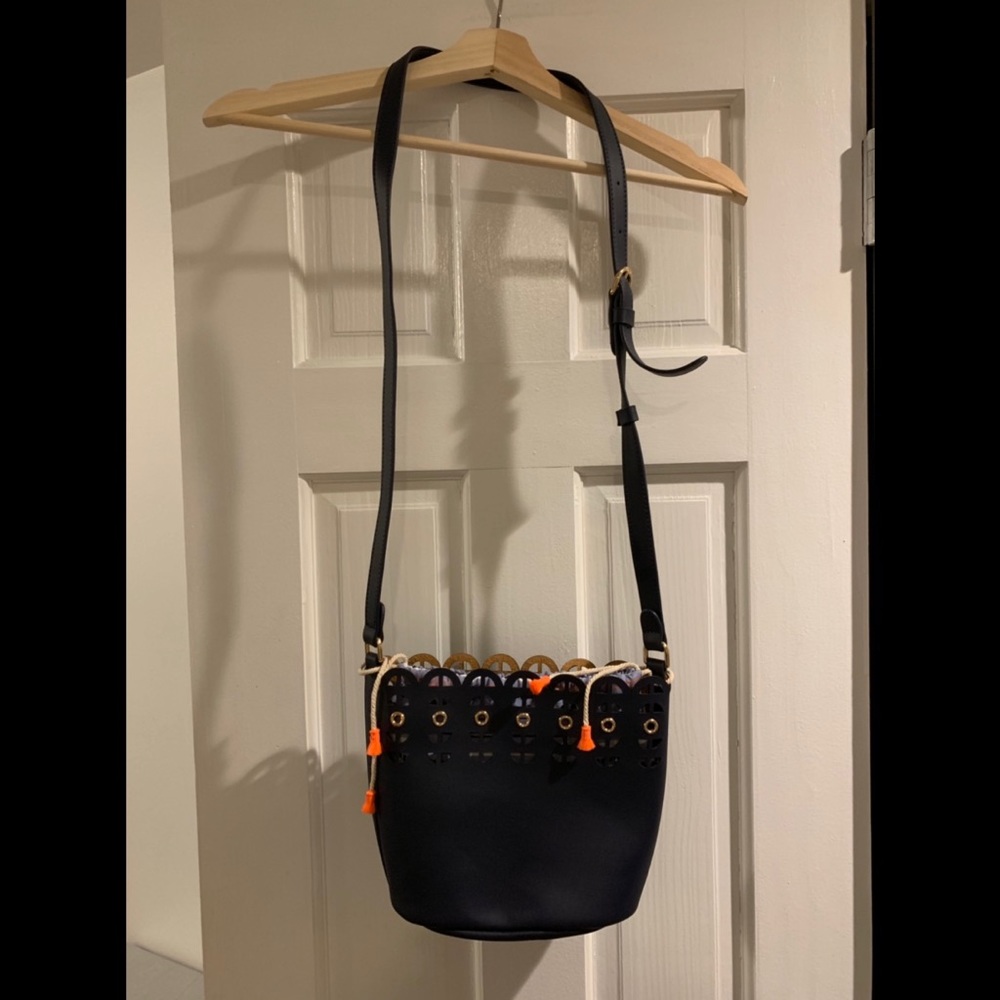 Navy crossbody bag with scalloped details